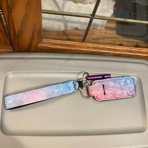 Chapstick holder with safety whistle